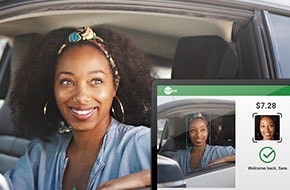 Woman going through drive-thru